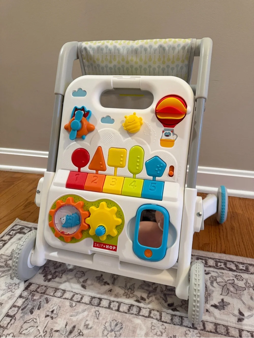 Skip Hop White Push Walker with Red Orange Yellow Green Blue Activity Panel